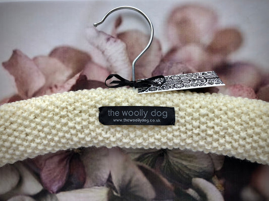 Children's Padded Hand Knitted Wool Hanger In Cream